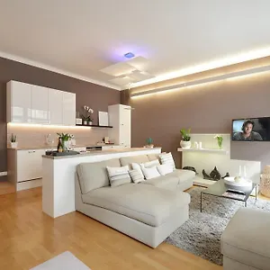 https://asante-designerapartment-deluxe.getmunichhotels.com